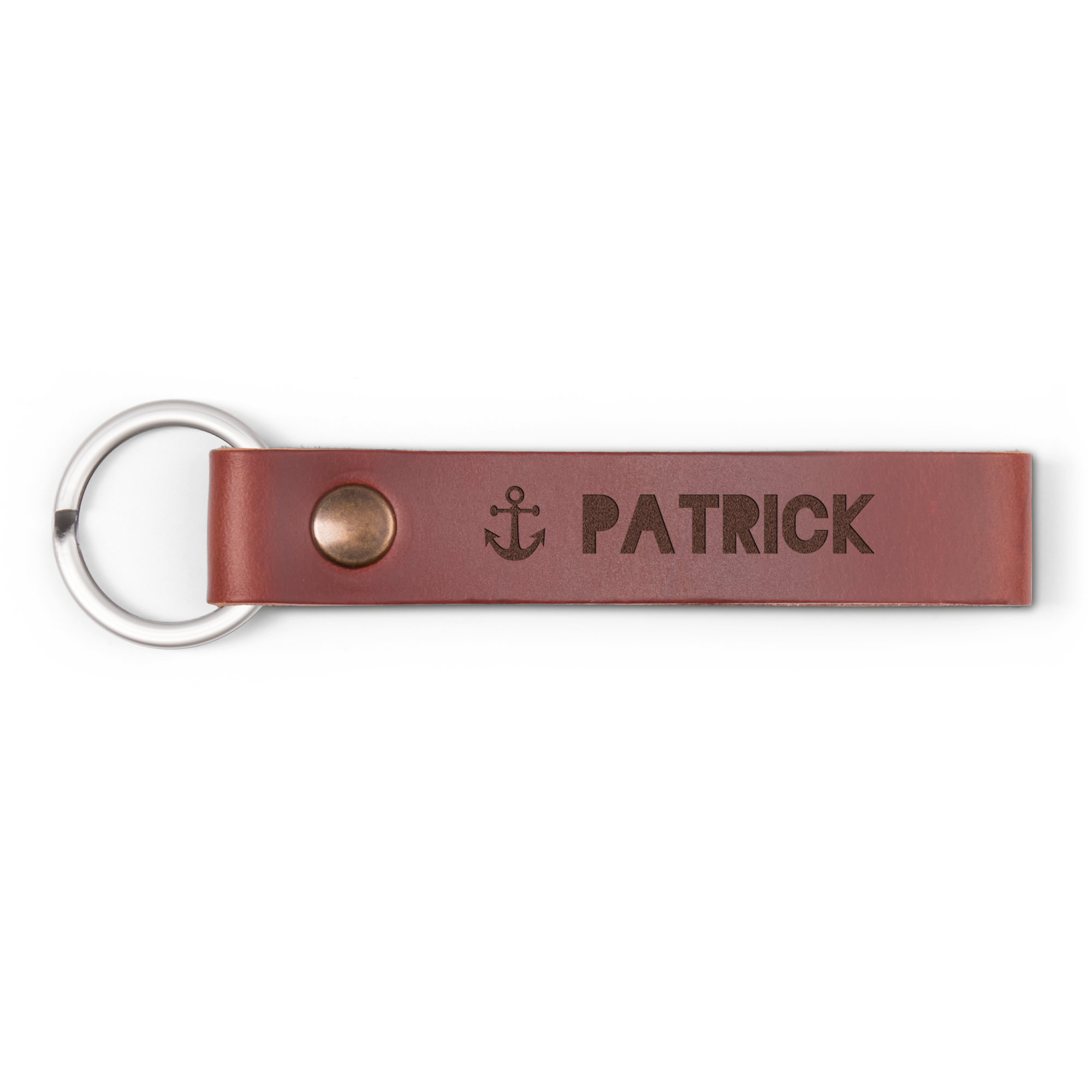 Portachiavi personalizzato in pelle color cuoio con nome PATRICK e ancora incisi
