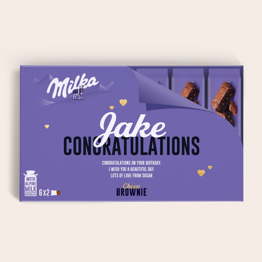 Milka Brownies Milka Choco Brownie -lahjalaatikko, jossa nimi Jake ja onnitteluviesti syntymäpäivätoivotuksin.