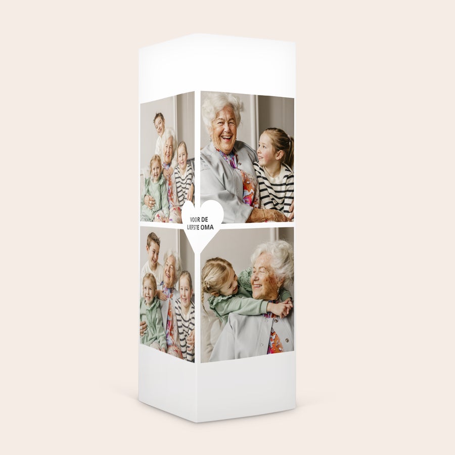 Gepersonaliseerd M&M's cadeaupakket Gepersonaliseerd M&M's cadeaupakket met geprinte foto's van oma en kleinkinderen en de tekst Voor de liefste oma