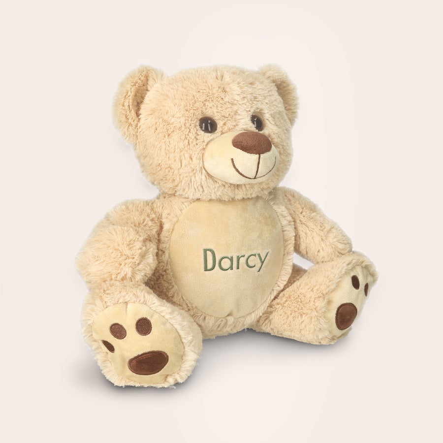 Personalised baby's first teddy bear Personalised baby's first teddy bear with an embroidered name Darcy on its tummy