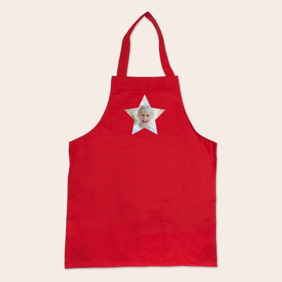 Șorț pentru copii Șorț personalizat pentru copii, roșu, imprimat cu fotografia unei fetițe blonde într-o stea decupată.