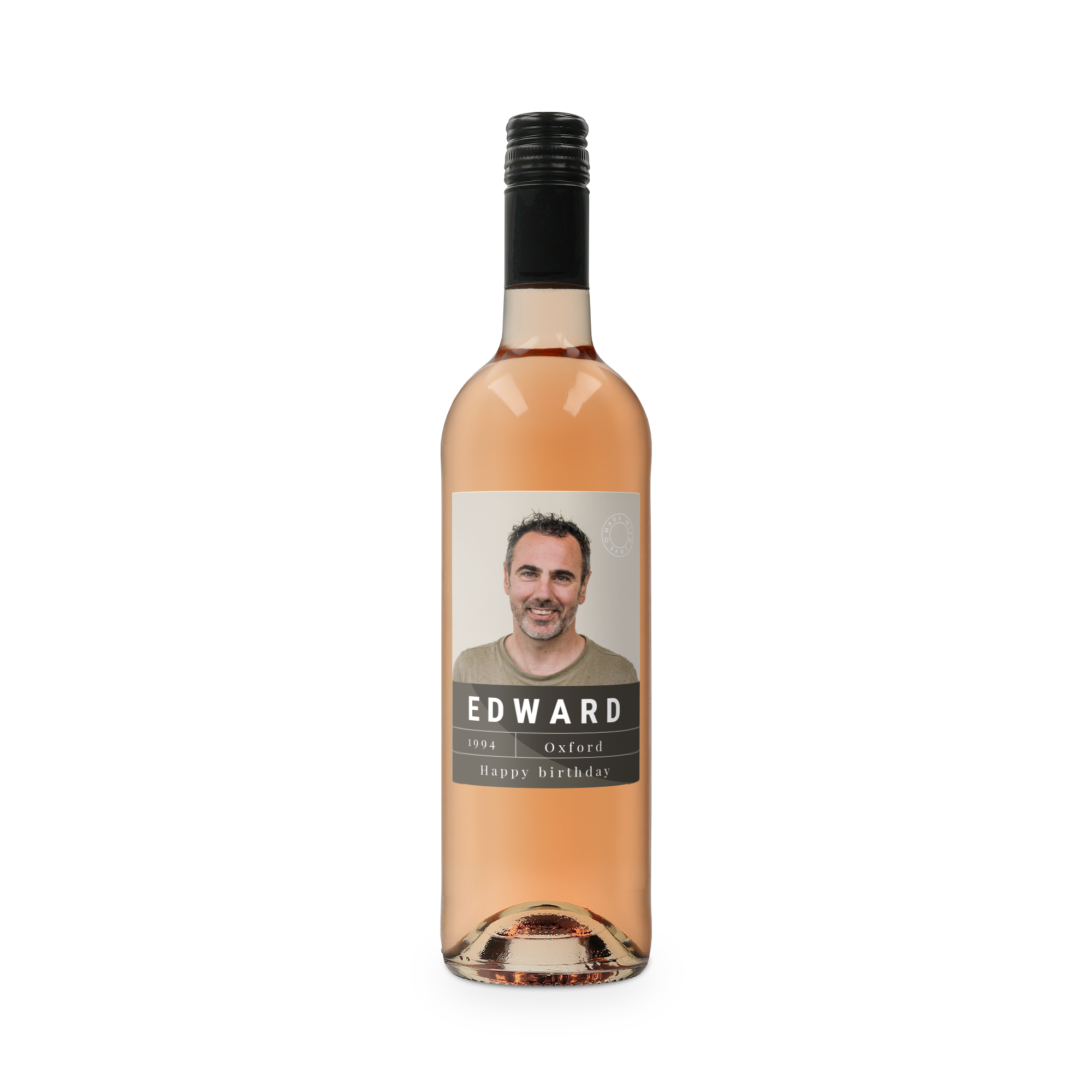 Botella de vino rosado Belvy con etiqueta personalizada, impresa con la foto de un hombre sonriente, el nombre "EDWARD", el año "1994", "Oxford" y "Happy birthday".