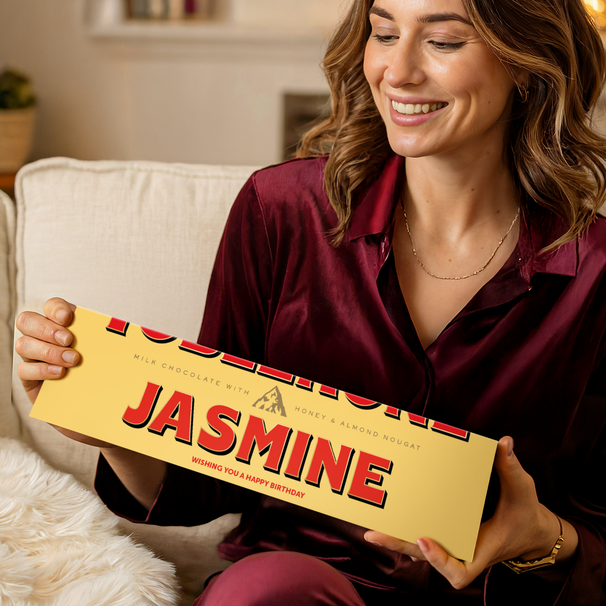 Personalised Toblerone bar - 1800 grams with a custom printed name Jasmine and a birthday message on the yellow packaging.