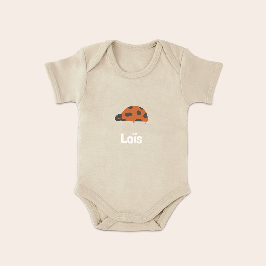 Rompertje bedrukken Beige rompertje bedrukken met lieveheersbeestje en de naam Lois