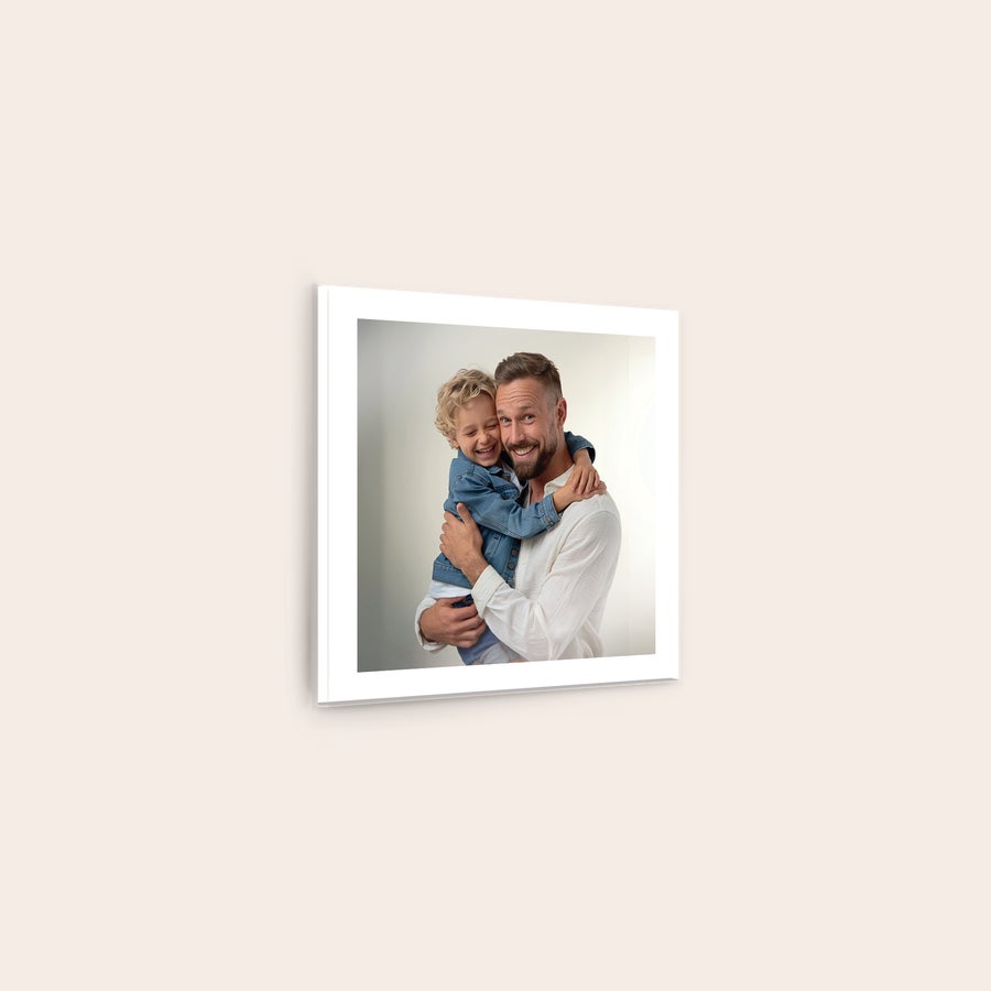 Photo on Acrylic Acrylic photo printed with a customized photo of a smiling father holding his child.