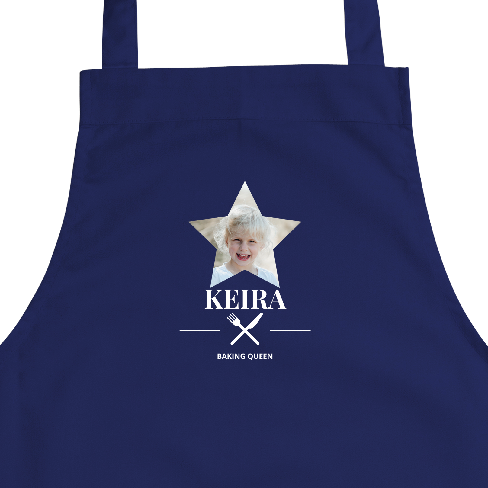 Delantal personalizado azul marino para niños con foto de niña rubia sonriente en estrella y nombre Keira impreso.
