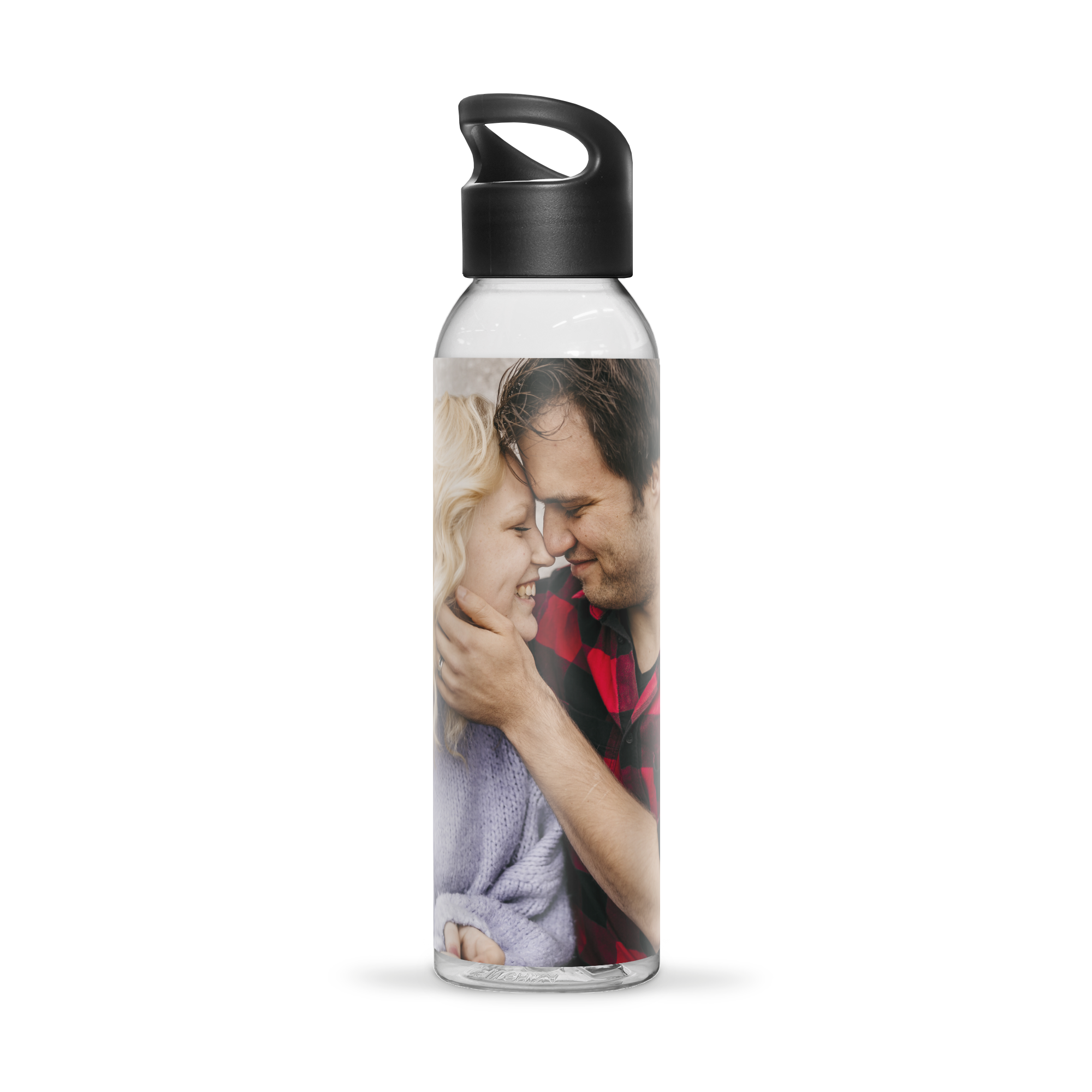 Personalized water bottle printed with a photo of a couple smiling.