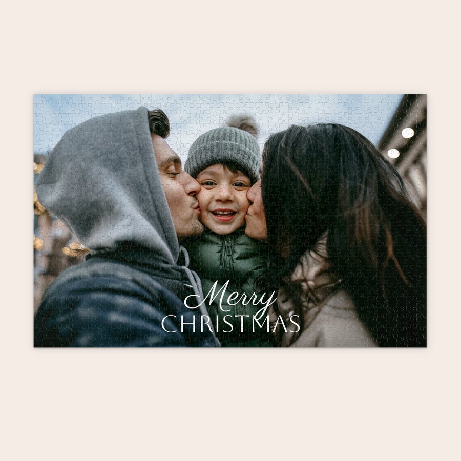 Puzzle con foto o texto Puzzle con foto impresa de una familia y texto "Merry Christmas" para crear un puzzle original.