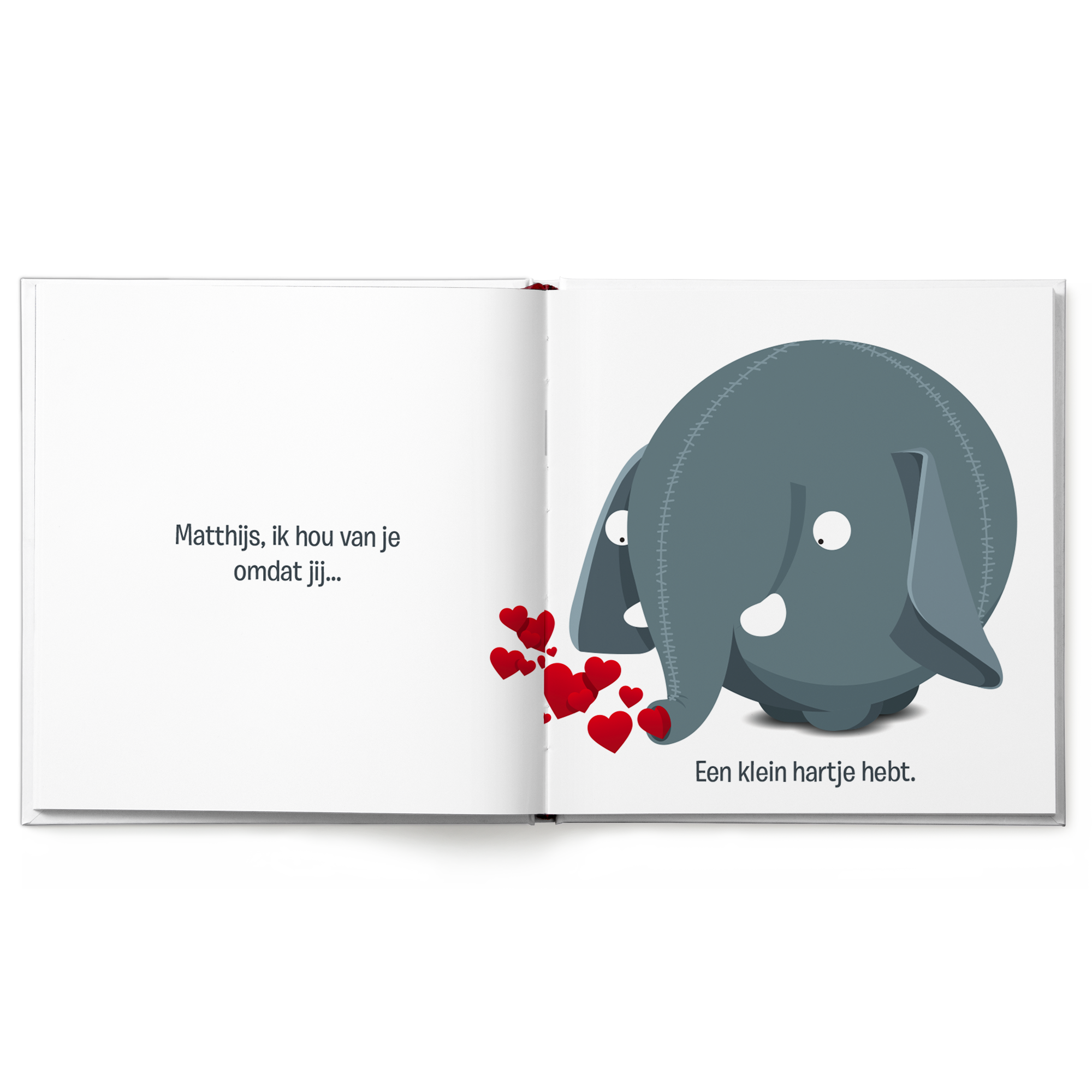 Open gepersonaliseerd kinderboek met illustratie van olifant en rode hartjes, tekst "Matthijs, ik hou van je omdat jij een klein hartje hebt". Boek "Je bent mijn Valentijn/Liefste" personaliseren met eigen tekst en naam.