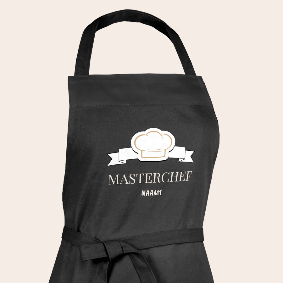 Personlig BBQ Forklæde Sort grillforklæde i bomuld med kokkehue og banner trykt med "MASTERCHEF" og personlig tekst