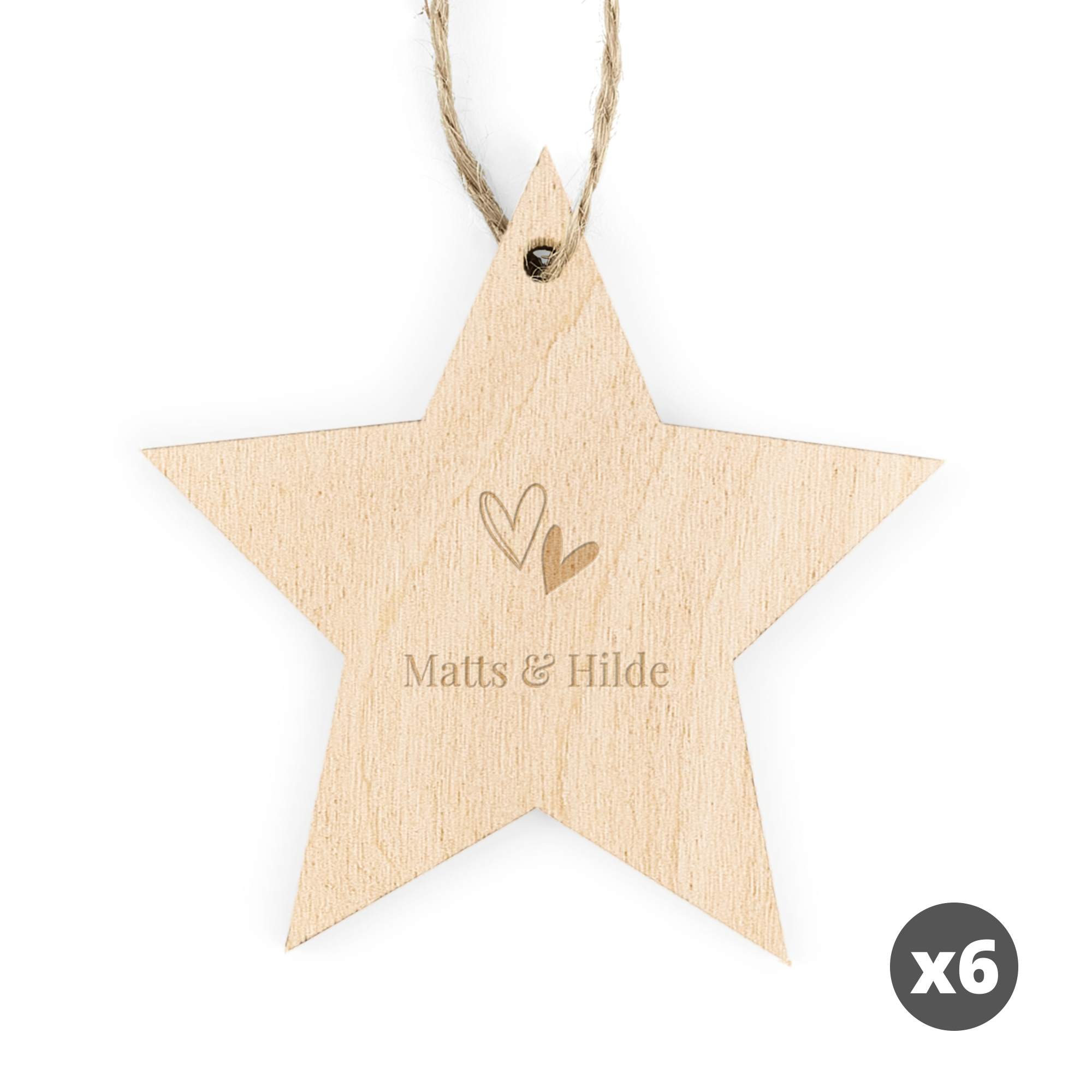 Gravert julestjernedekorasjon i tre