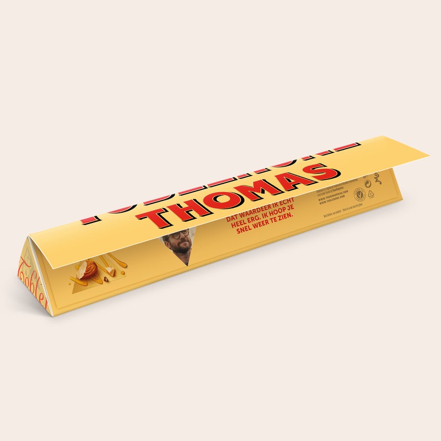 Toblerone met naam Gepersonaliseerde Toblerone reep met naam Thomas en foto van Thomas, 100 gram. Bedrukt met persoonlijke tekst.