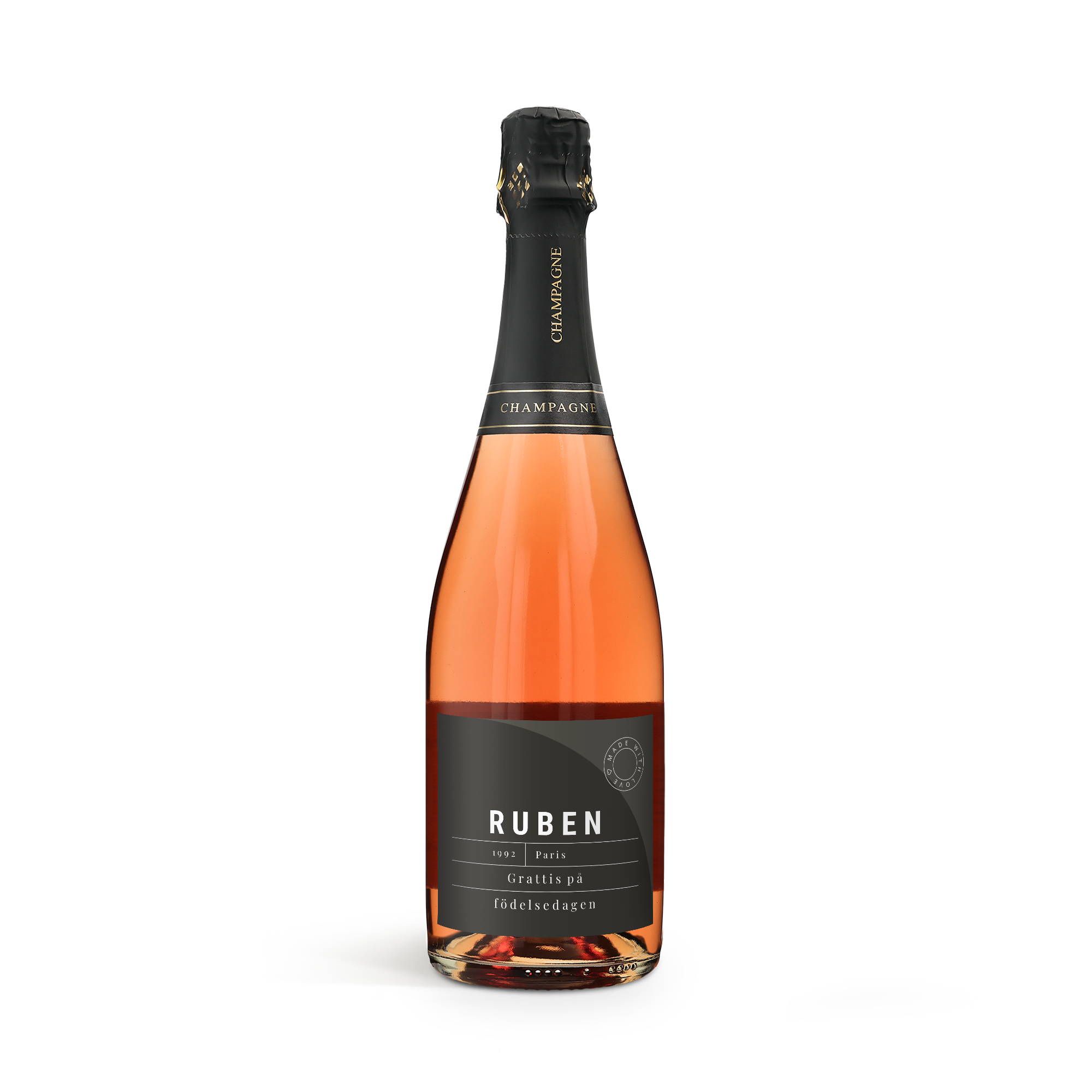 René Schloesser Rosé-champagne med personlig etikett. Etiketten är tryckt med texten "Ruben 1992 Paris Grattis på födelsedagen", perfekt för att fira valfritt tillfälle.