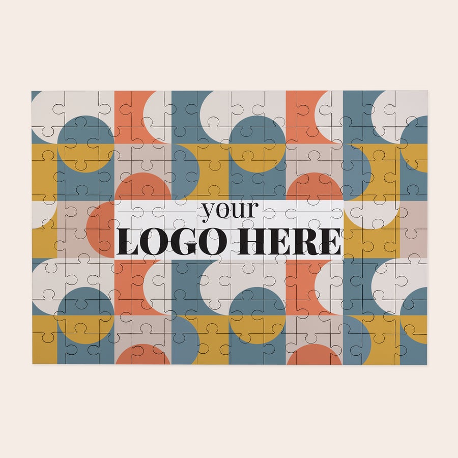 Kleines Fotopuzzle Kleines Puzzle mit Mustern und dem Text "your LOGO HERE" als personalisierbares Fotopuzzle bedruckt