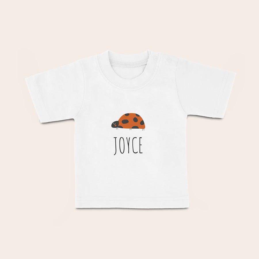 T shirt bébé personnalisé T-shirt blanc personnalisé pour bébé avec prénom JOYCE et un dessin de coccinelle imprimés