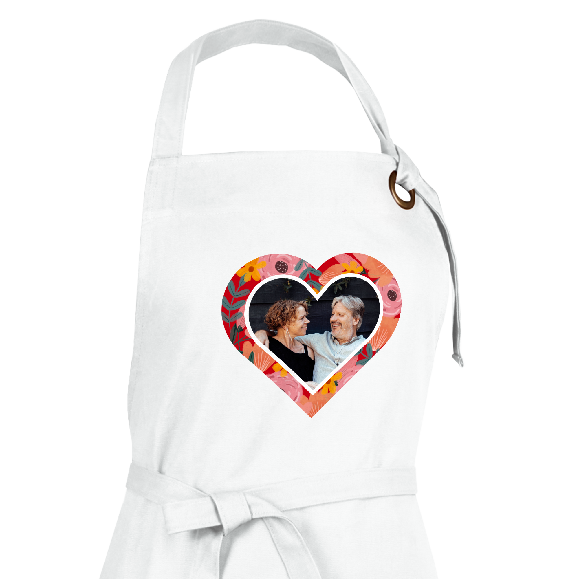 Grembiule da cucina bianco, personalizzato con una foto stampata di una coppia sorridente, incorniciata in un cuore floreale.