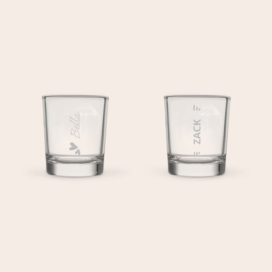 Shot Glasses Two personalized engraved shot glasses each with custom text, one with Bella and two hearts and the other with Zack