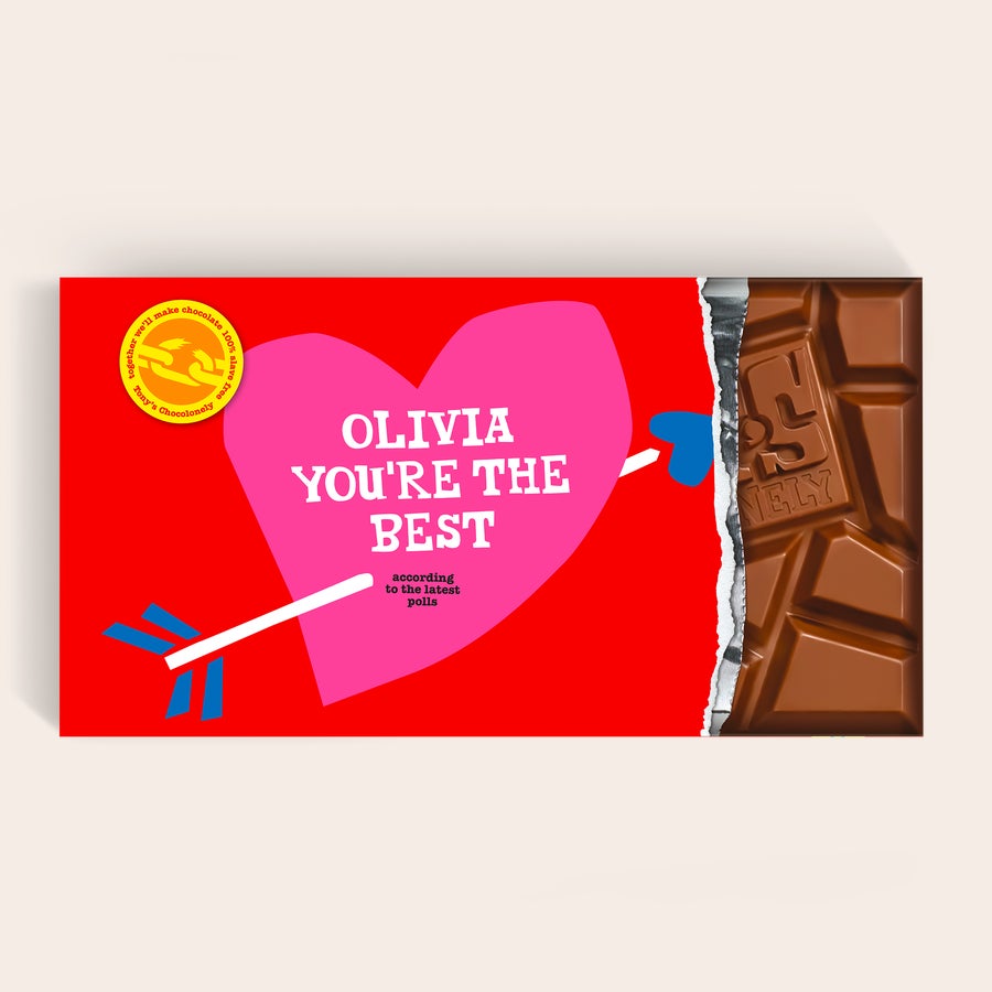 Barra de chocolate XL Tony's Chocolonely (5 barras de chocolate) Barra de chocolate XL Tony's Chocolonely personalizada. Envoltorio rojo con corazón rosa, flecha y texto impreso "Olivia You're The Best".