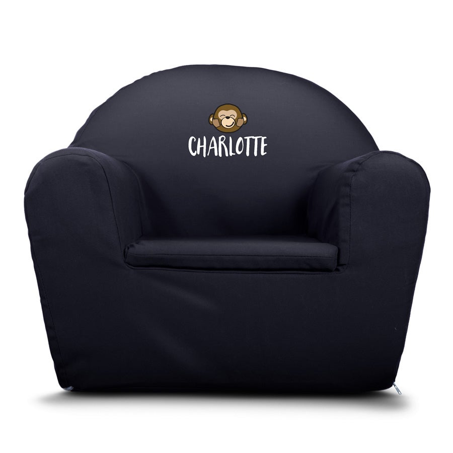 Dark blue children's chair with a printed monkey icon and the name Charlotte, a cute personalized chair.