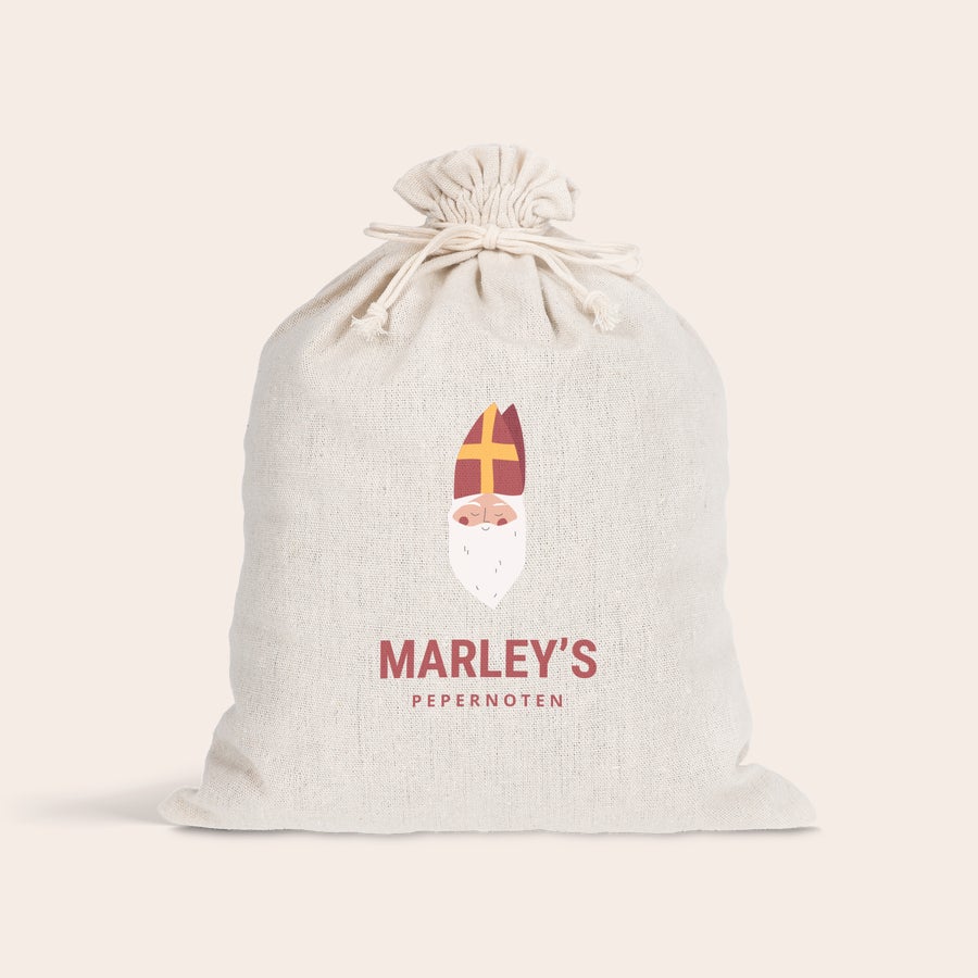 Pepernoten zakje bedrukken Gepersonaliseerd katoenen Sinterklaas zakje met tekening en de tekst "MARLEY'S PEPERNOTEN" bedrukt.