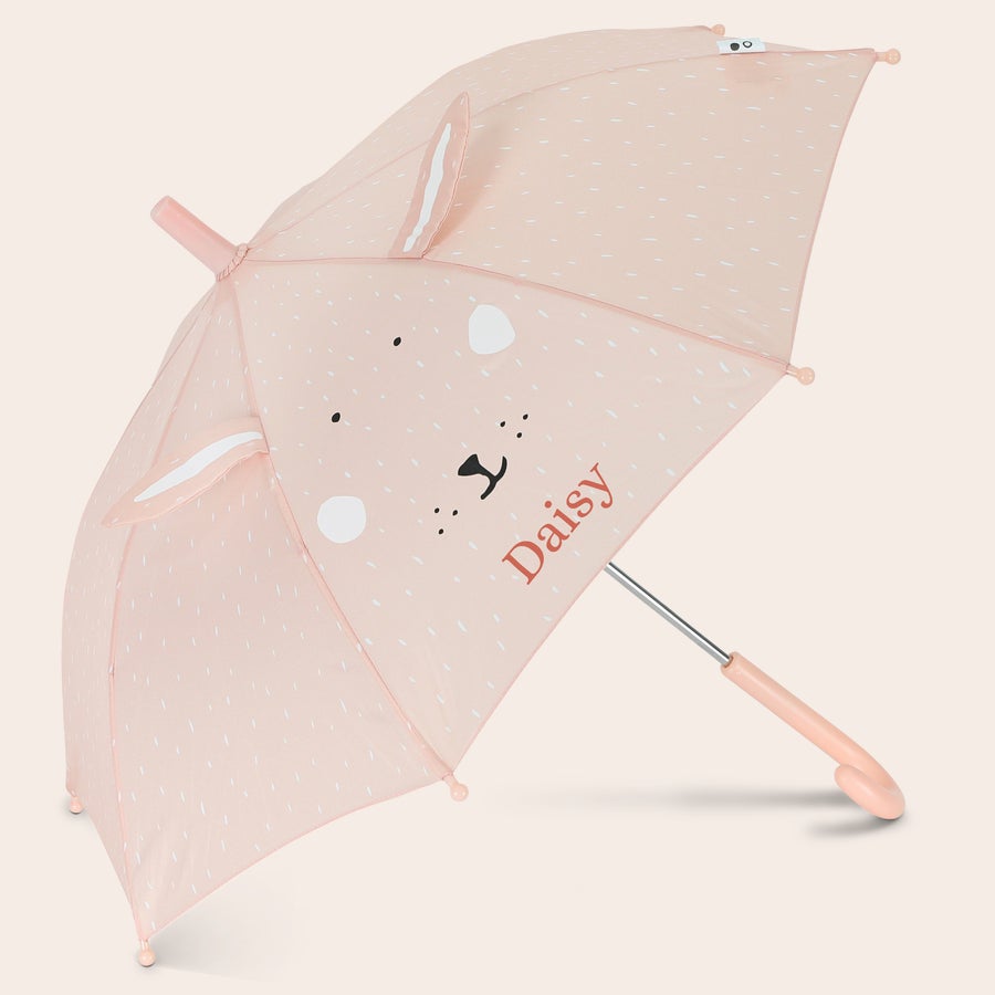 Umbrelă pentru Copii Personalizată - Trixie Umbrelă roz, în formă de iepure, cu urechi detașabile, model cu picături, imprimată cu numele Daisy. Plimbarea în ploaie devine mai plăcută cu această umbrelă în formă de animal cu nume.