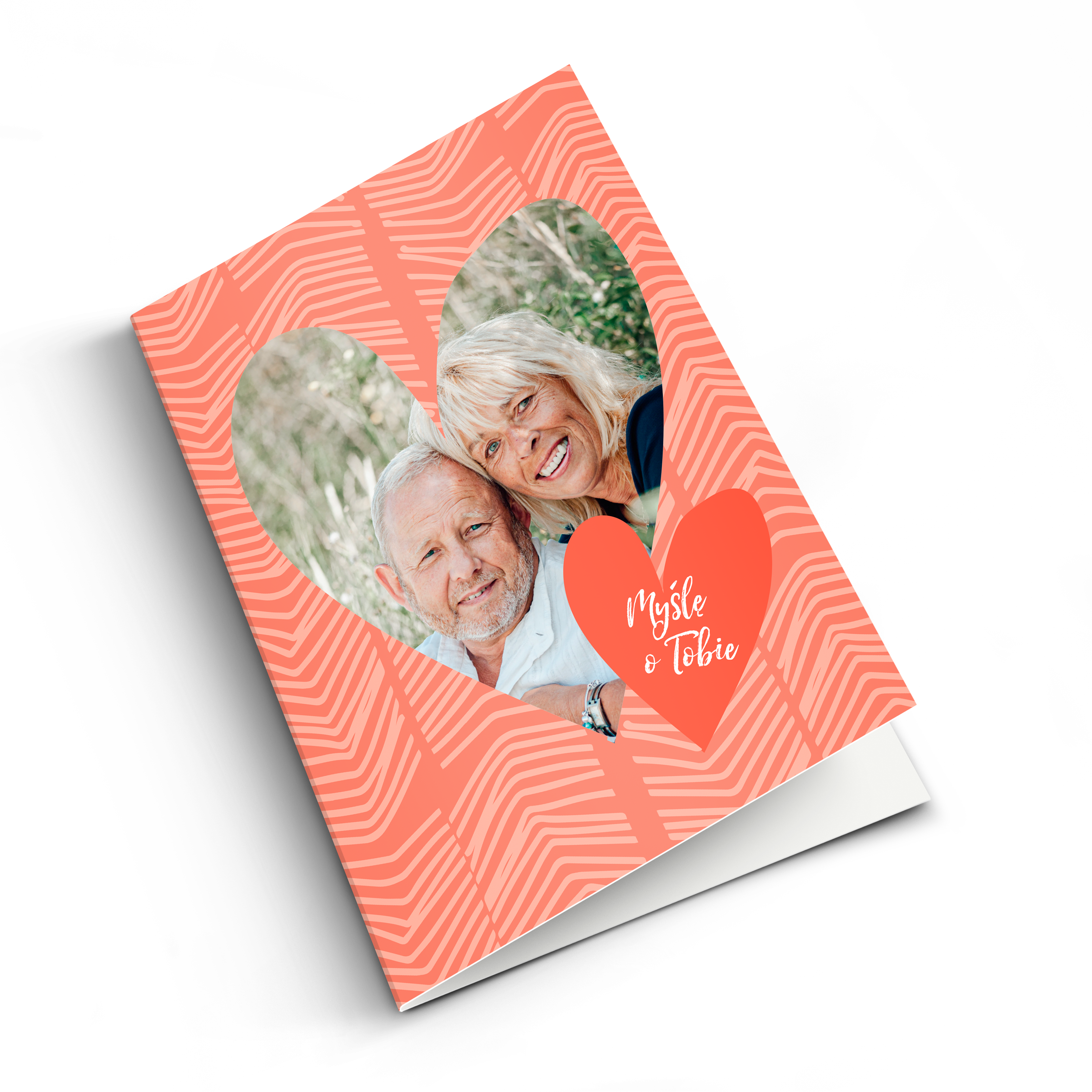 Fotokartka z nadrukowanym zdjęciem pary w kształcie serca i tekstem "Myślę o Tobie"