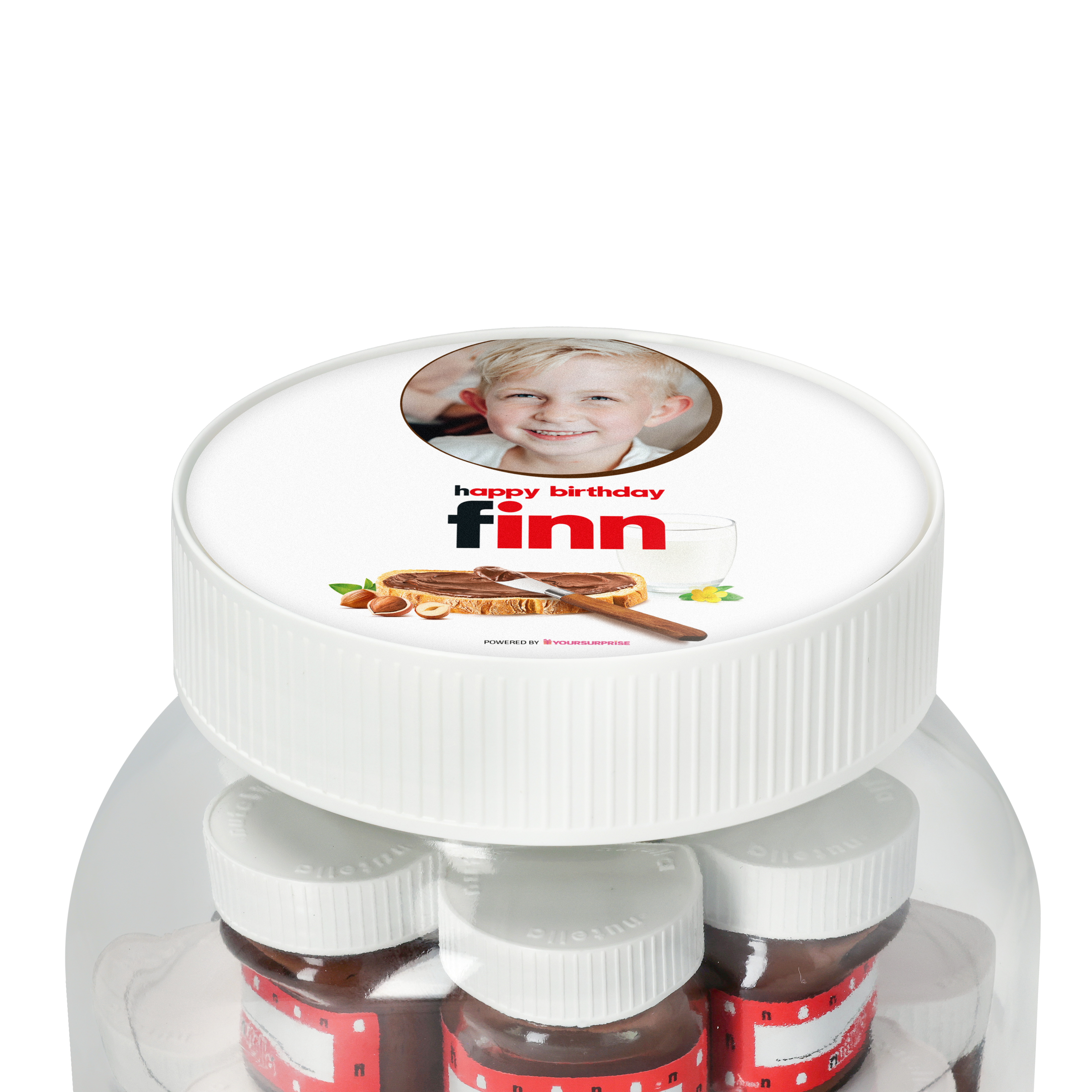 Personalisiertes nutella® Glas XL mit Namen und Foto. Die weiße Geschenkverpackung ist mit dem Foto eines lächelnden blonden Jungen, dem Text 
