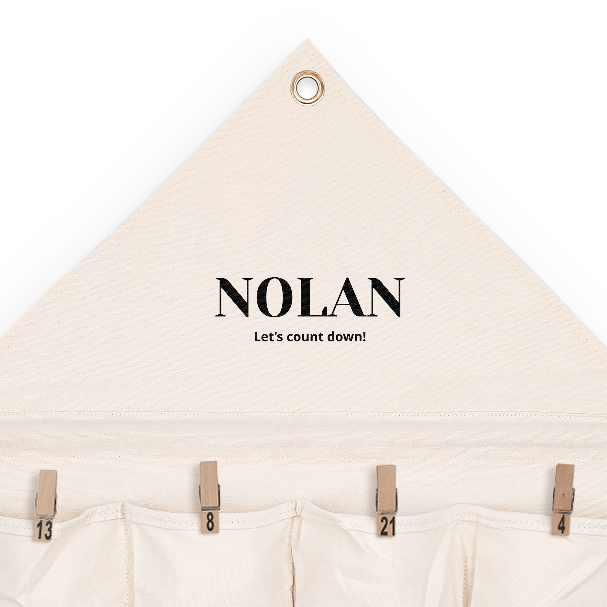 Fabric advent calendar printed with the name Nolan and a message to count down to Christmas