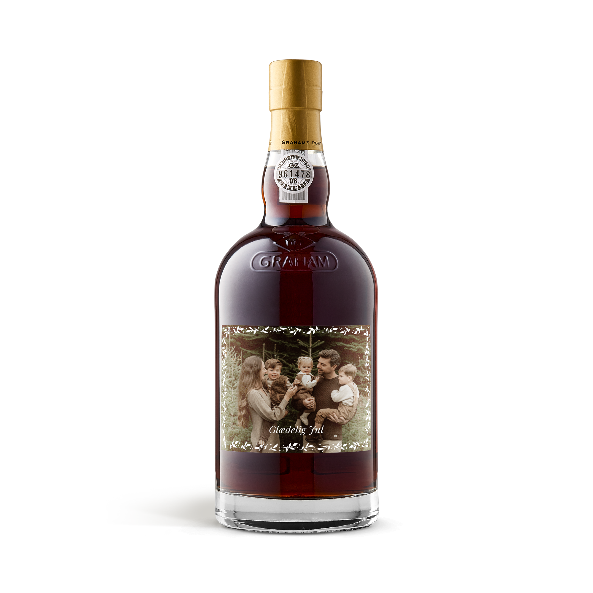 Grahams 20 år portvin med fotolabel trykt med billede af familie og teksten "Glædelig Jul"
