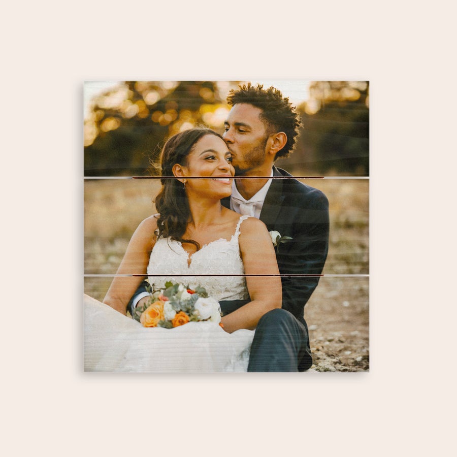 Photo on wood A personalized wedding photo printed onto wooden planks showing a couple in an embrace