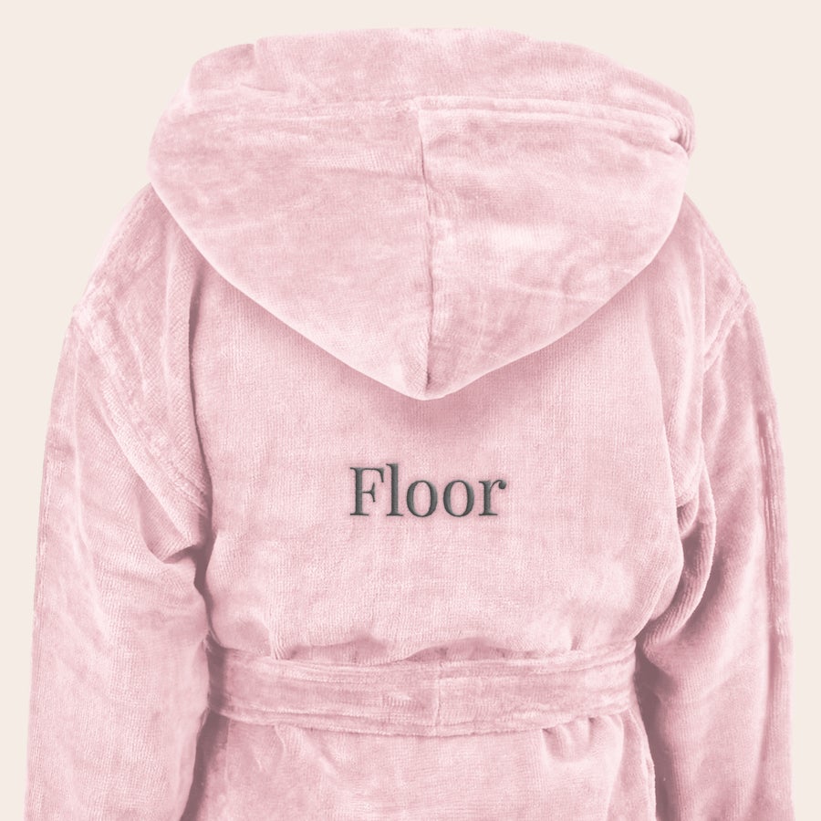 Badjas kind met naam Roze kinderbadjas met capuchon, geborduurd met de naam Floor.