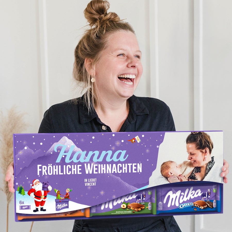 Riesen Milka Schokolade Personalisiert Riesen Milka Schokolade personalisieren mit Foto & Name - 6 Tafeln. Lila Verpackung mit Aufdruck "Hanna Fröhliche Weihnachten in Liebe! Vincent" und Foto.