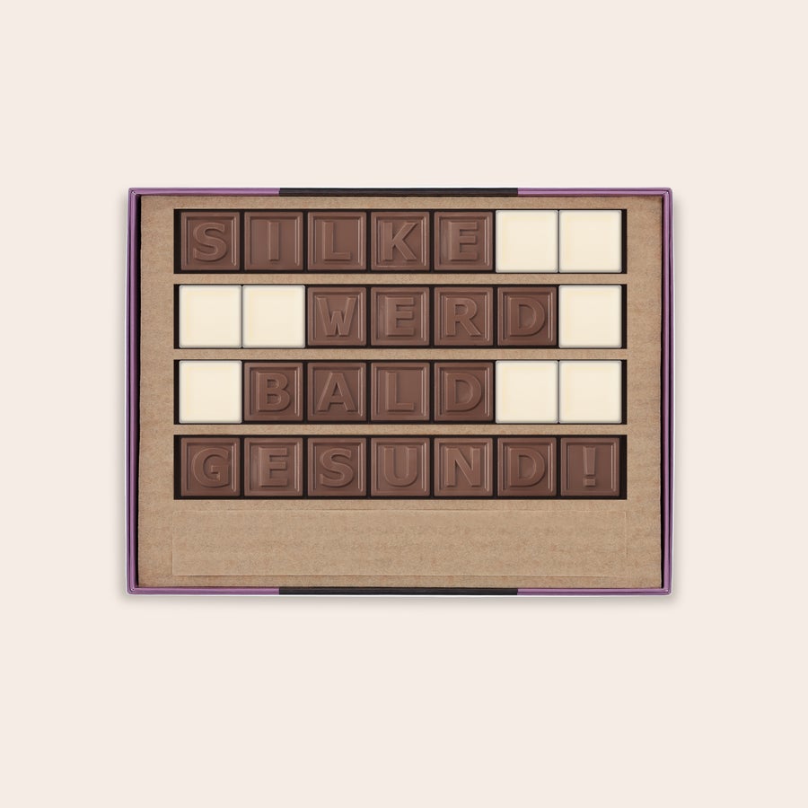 Schokotelegramm Selber Gestalten Schokoladentelegramm mit der persönlichen Nachricht SILKE WIRD BALD GESUND aus Milch- und weißer Schokolade