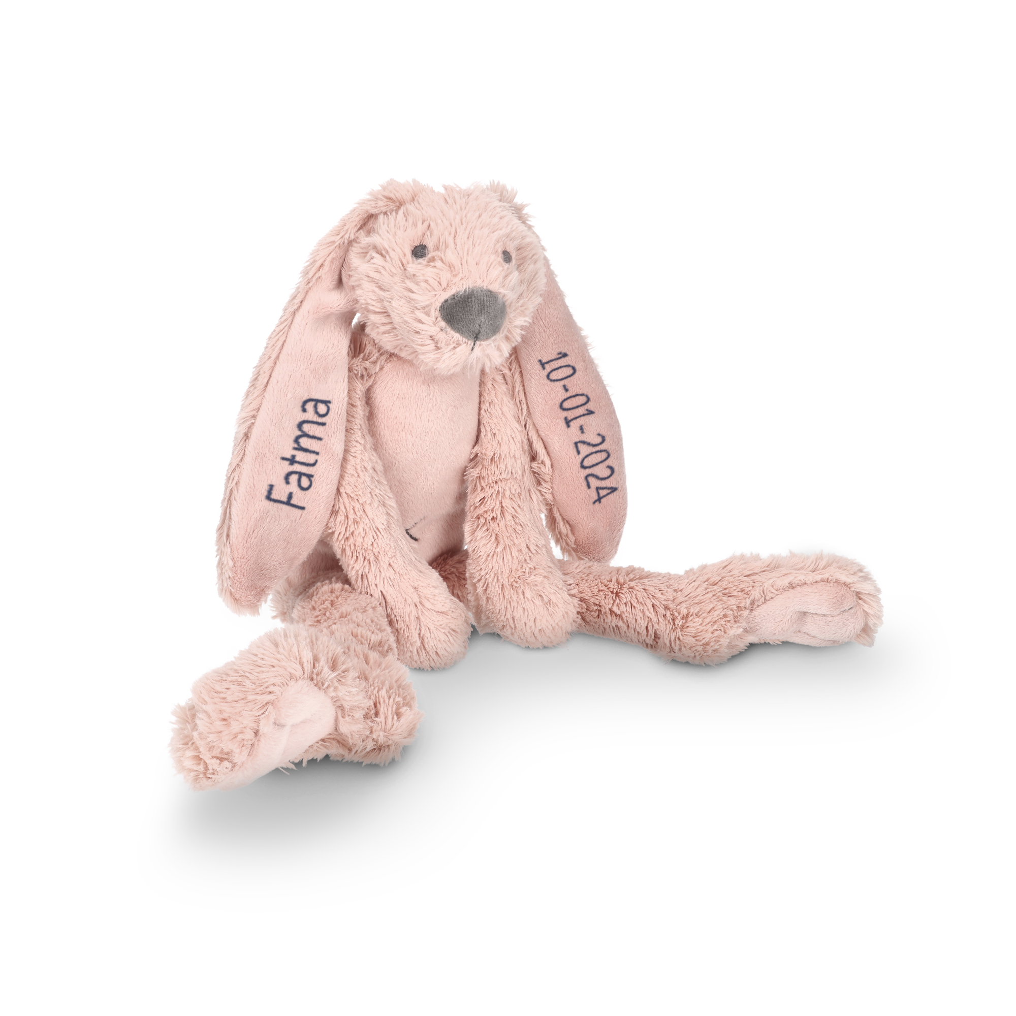 Doudou lapin rose pâle personnalisé Fatma et 10-01-2024 brodés sur les oreilles pour des câlins uniques.