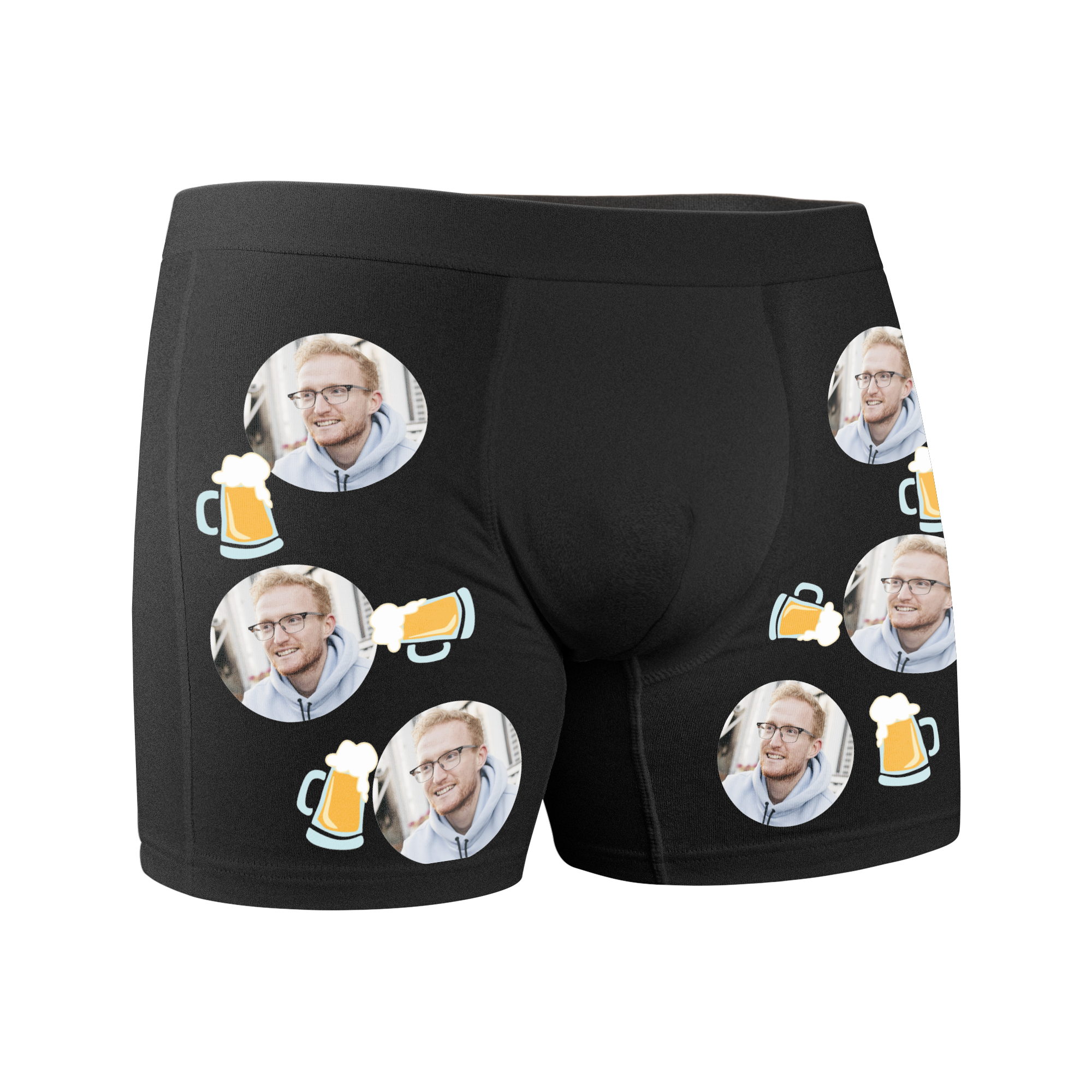 Mustat bokserit, joissa toistuva kuvio. Kuvioissa näkyy hymyilevän miehen kasvot ja oluttuoppi.