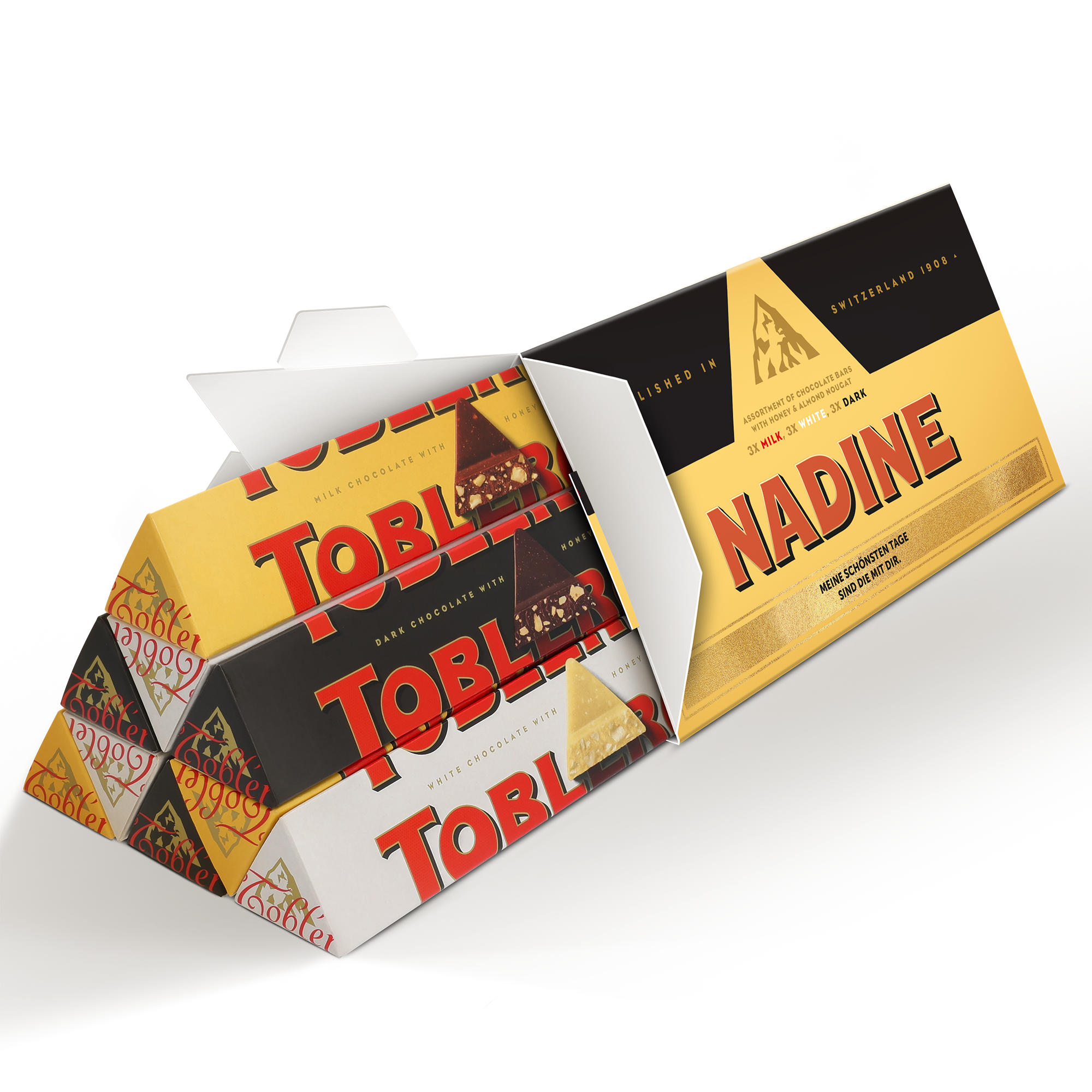 XL Toblerone mit persönlichem Namen Nadine und Text "Meine schönsten Tage sind die mit dir" auf der Verpackung bedruckt, enthält neun Toblerone Riegel
