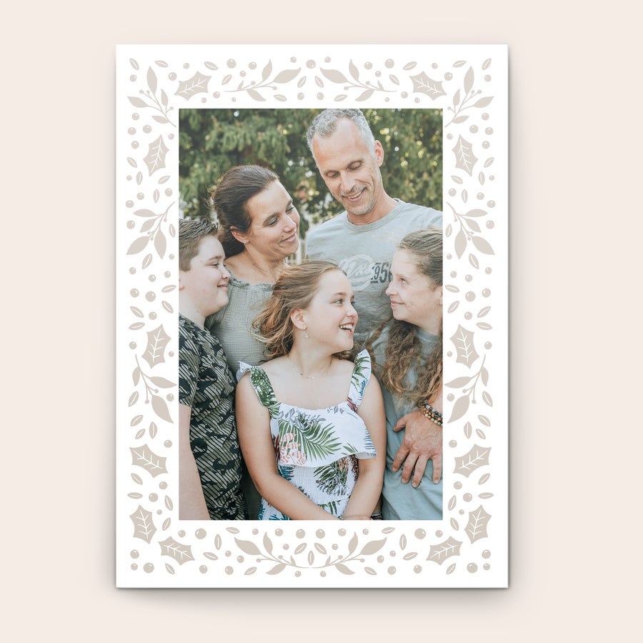 Tarjeta de Navidad Tarjeta de felicitación personalizada con foto familiar impresa y un borde decorativo navideño.