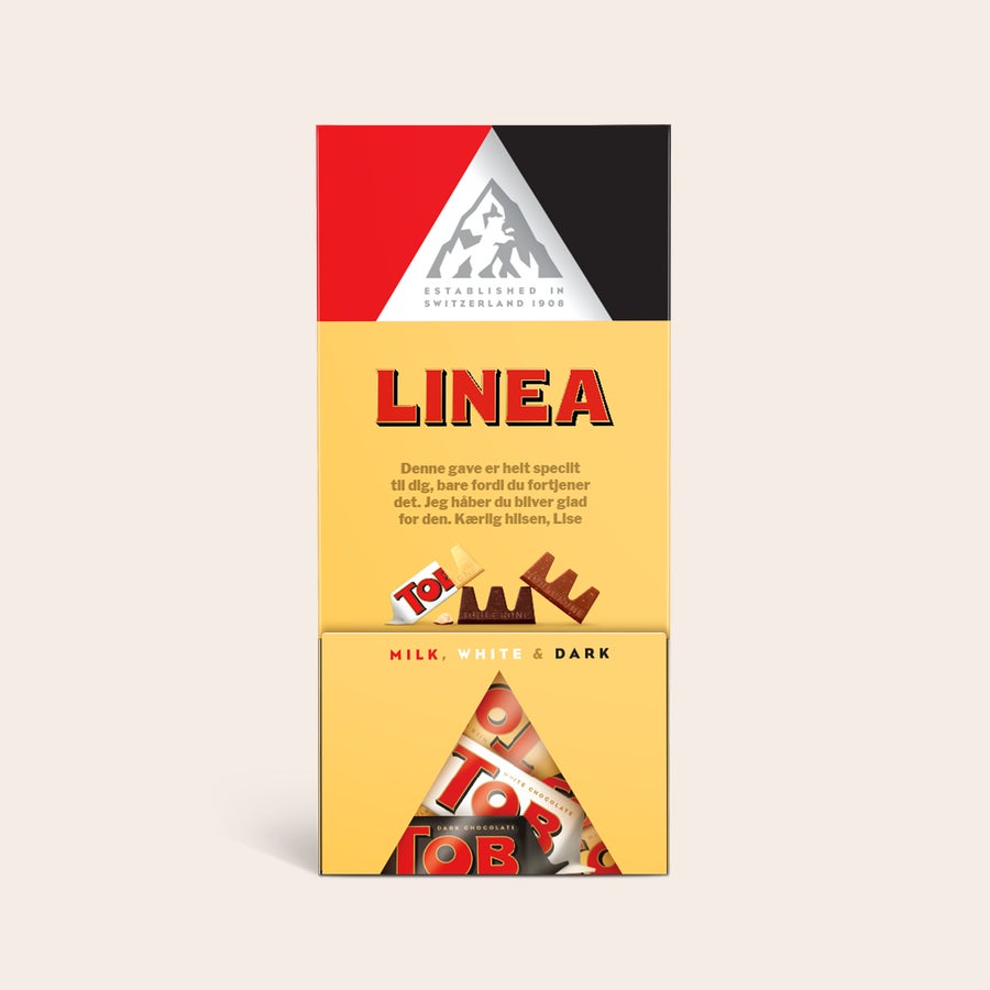 Toblerone chokolade dispenser Personlig Toblerone-chokoladedispenser med navn og besked, indeholder mælke-, hvid og mørk chokolade.