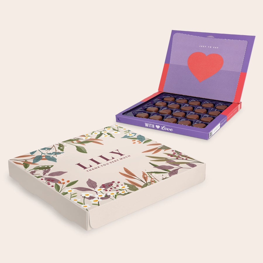 Personliga Milka presentförpackning - Tack Personlig Milka presentförpackning med blommotiv och texten LILY THANK YOU VERY MUCH, tryckt i fyrfärg.