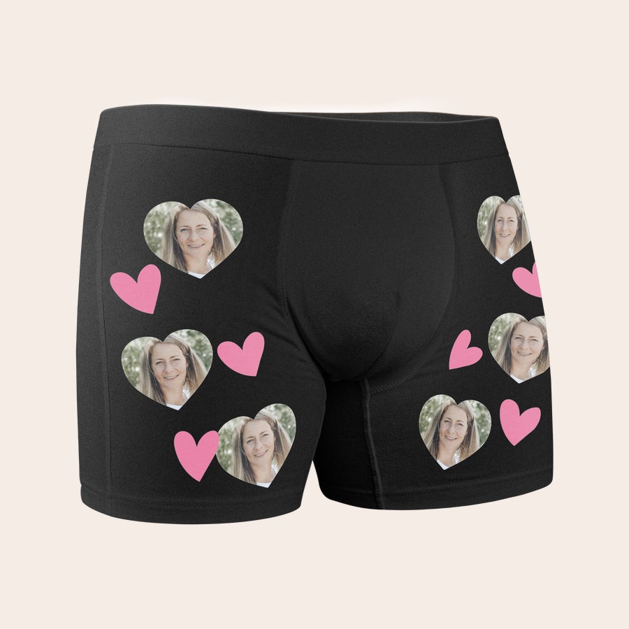 Personalised boxer shorts Black personalized boxer shorts featuring a photo of a woman printed in heart shapes with pink heart accents