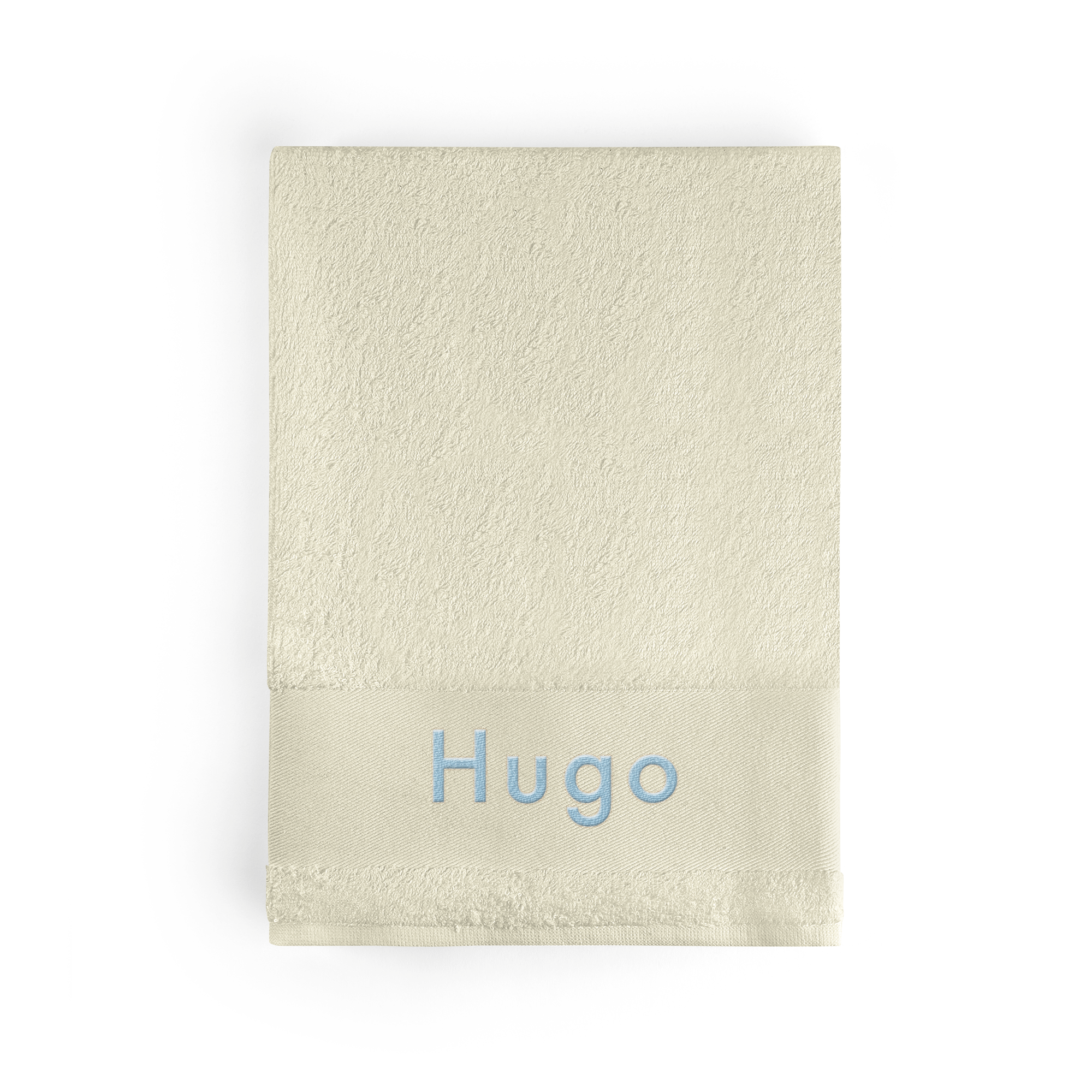 Serviette de bain beige personnalisée avec le prénom Hugo brodé en bleu clair