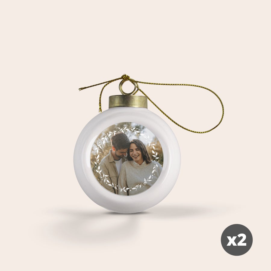 Personalised Christmas Baubles – Ceramic (2 pcs) White personalized Christmas baubles with a photo of a couple and a decorative border