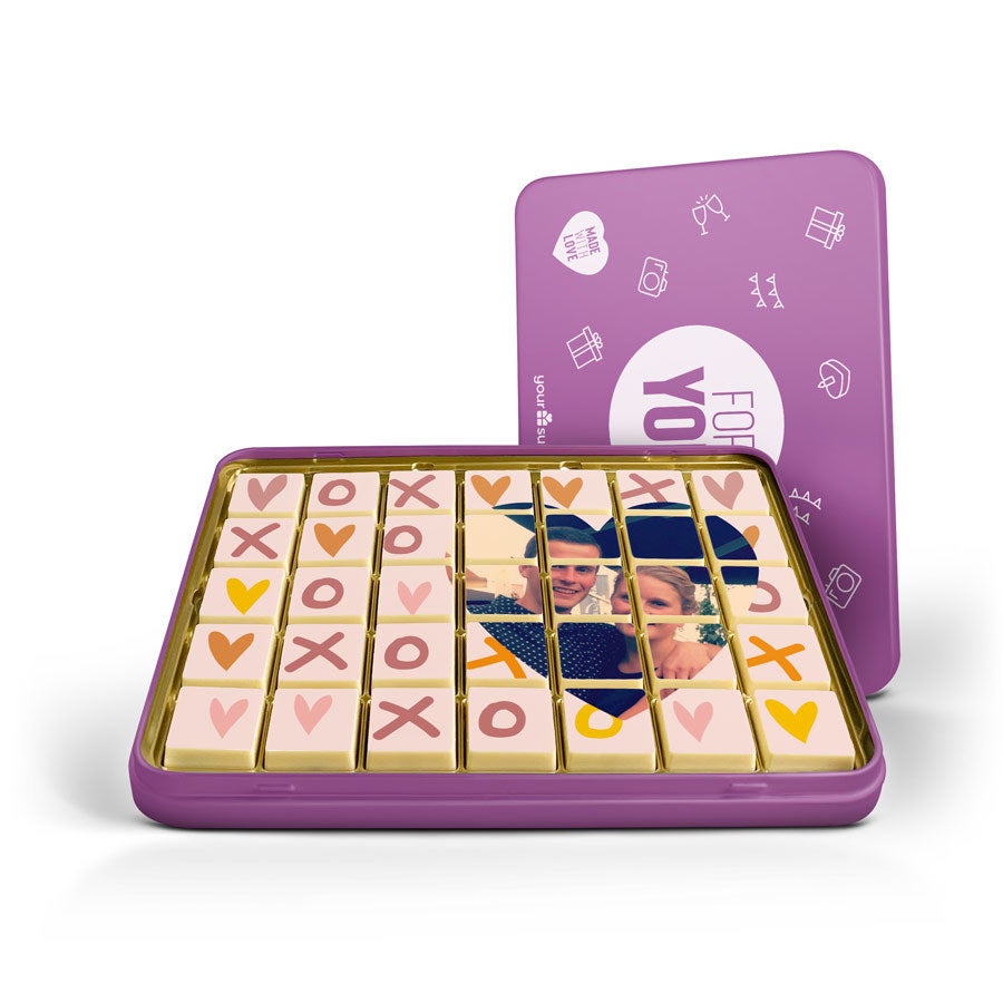 Foto op chocolaatjes in geschenkblik Foto op chocolaatjes in geschenkblik