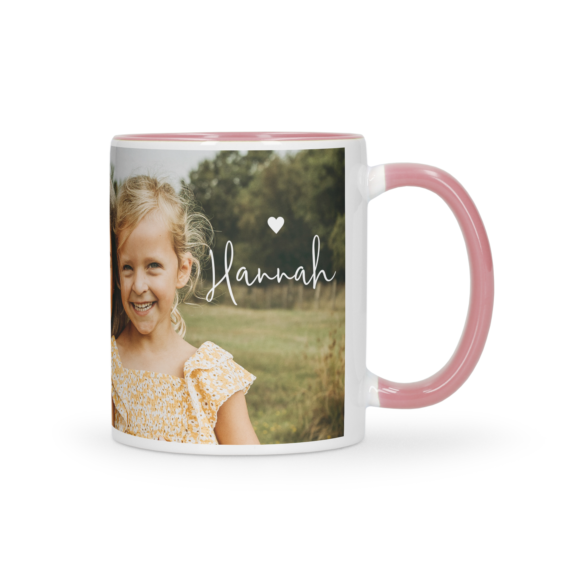 A personalised white and pink coloured mug with a printed photo of a smiling girl and the name Hannah.