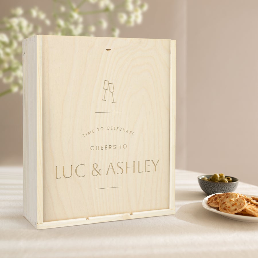 Personalised Wooden Gift Box Personalised wooden case for wine engraved with “Time to Celebrate Cheers to Luc & Ashley” and two champagne glasses