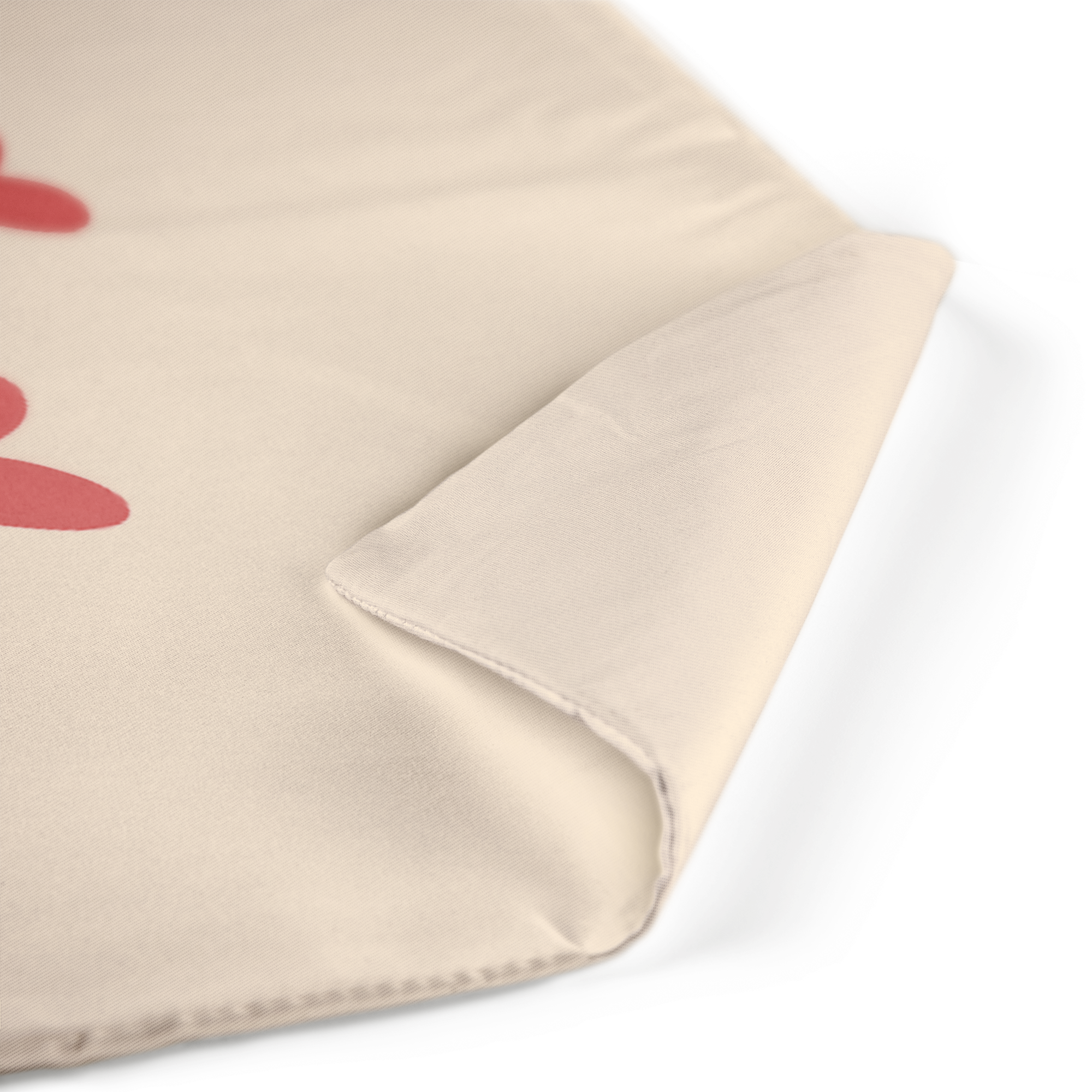 Vaaleanbeige tyynynpäällinen, jossa on painettu kuva. Tyynynpäällinen on muuta mikä tahansa tila kauniisti yksilöllisellä tyynynpäällyksellä.