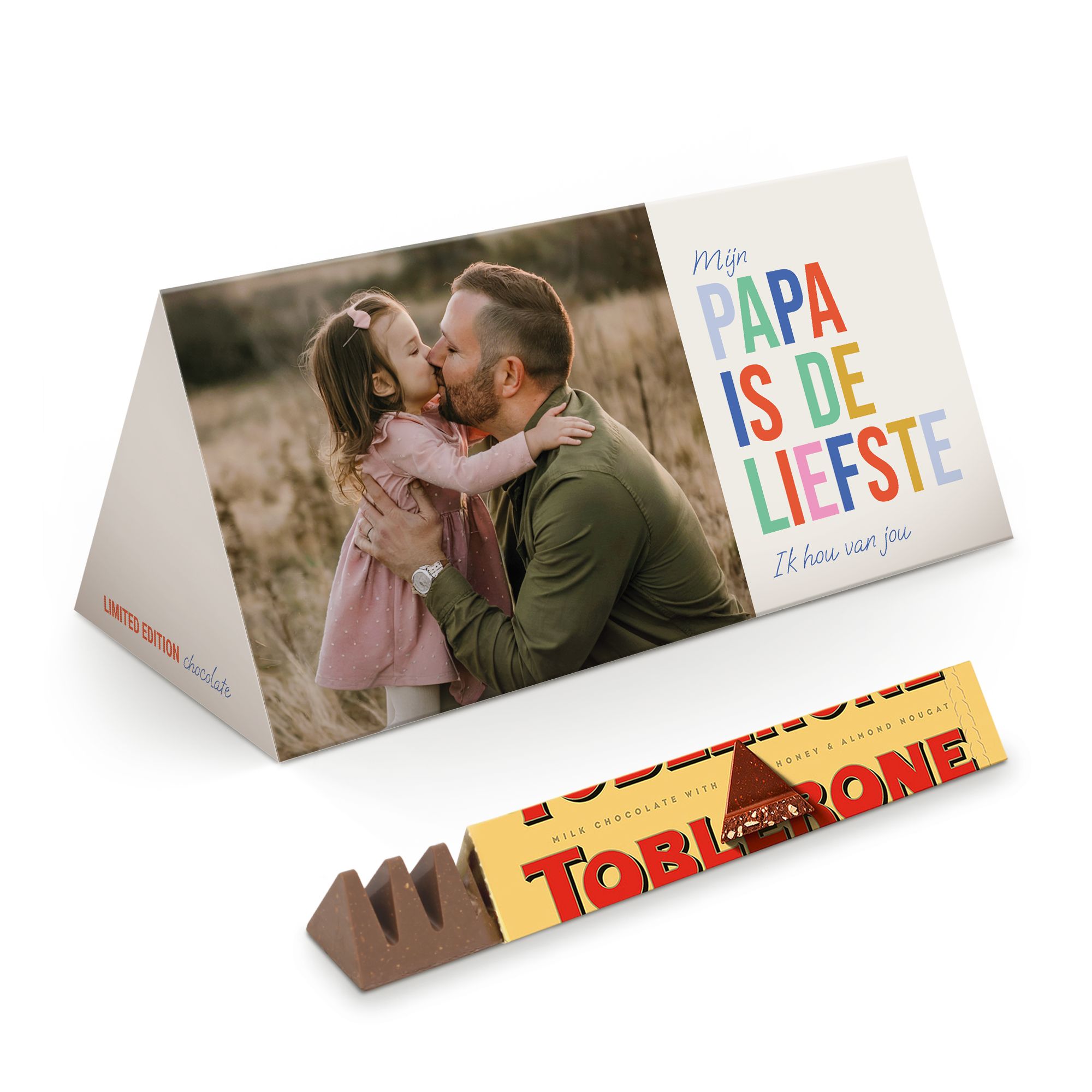 Gepersonaliseerde Toblerone XL reep met foto van vader en dochter en de tekst 'Mijn papa is de liefste, Ik hou van jou', bedrukt op de wikkel.