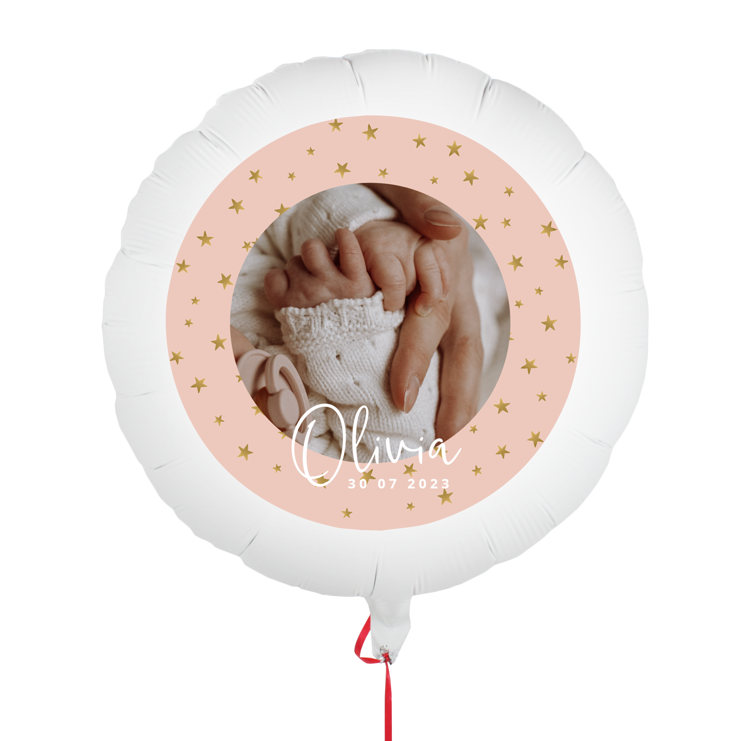 Vit personlig fotoballong med rosa mittfält med guldfärgade stjärnor, ett tryckt foto av en bebis hand, namnet Olivia och datumet 30-07-2023.