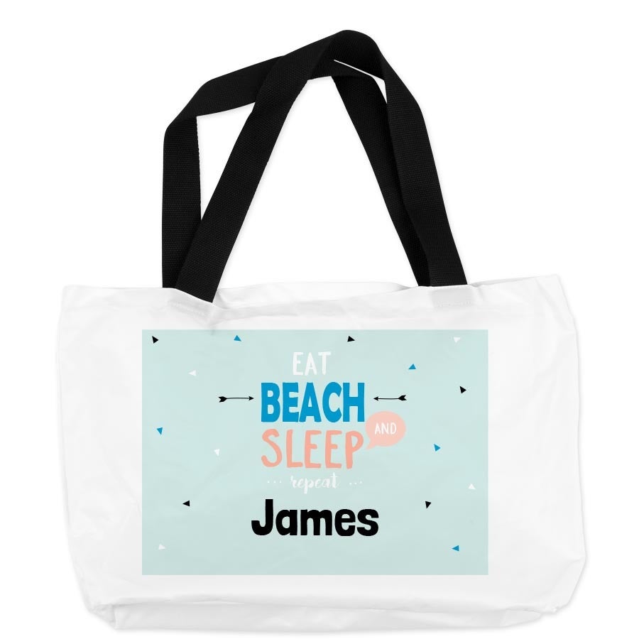 Bolsa de praia personalizada branca com alças pretas, estampada com "Eat Beach Sleep Repeat James"