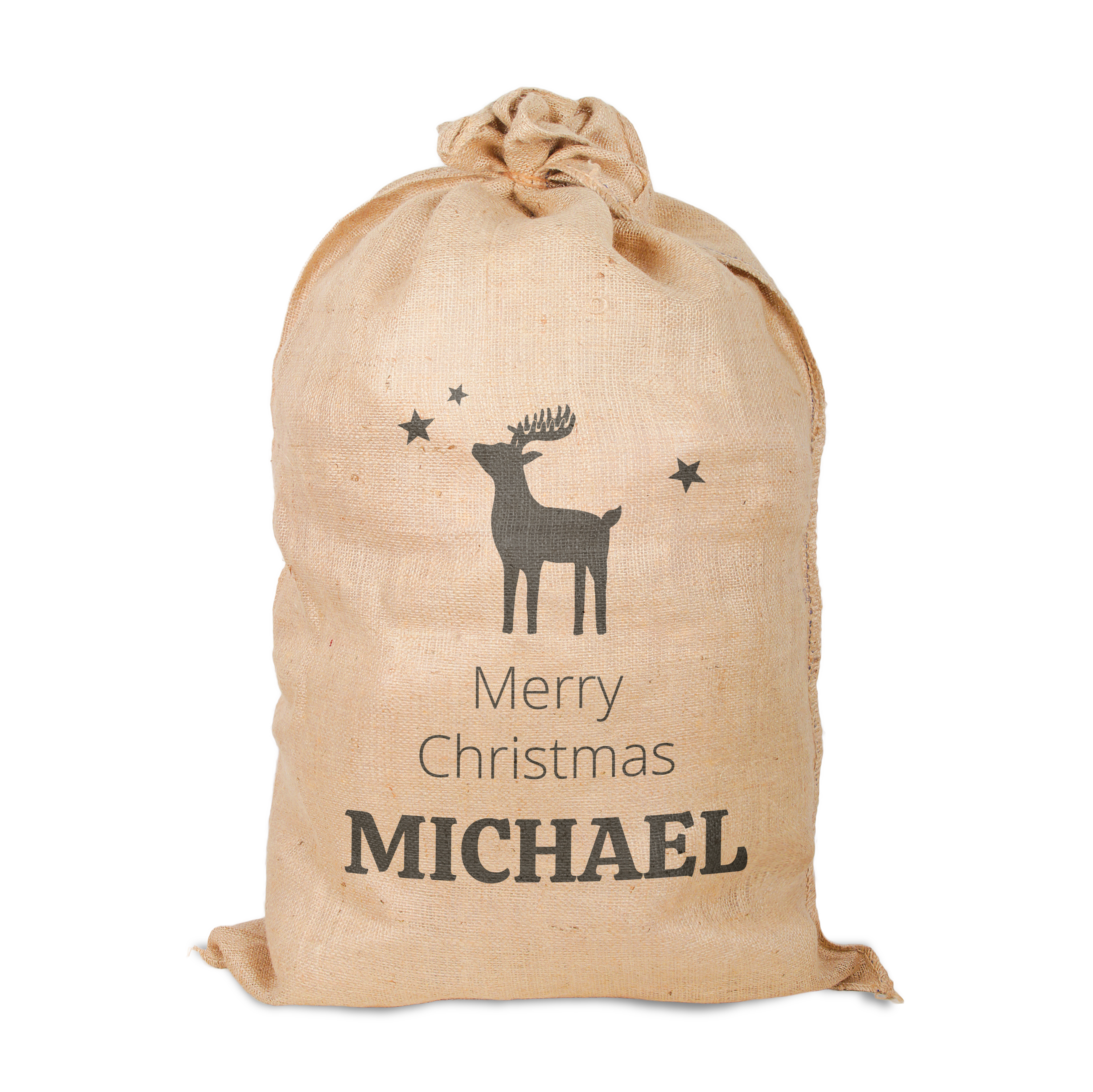 Joululahjat juuttipussissa painettuna Michael-nimellä ja "Merry Christmas" toivotuksella, jossa on porokuvio.